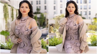For her look, the actress donned a gorgeus dress from the shelves of fashion brand Julfermilano. The dress features a captivating halter neck design, sheer fabric, a flattering bodycon fit, attached full sleeves and an alluring abstract print in shades of brown. (Instagram/@sunnyleone) For her look, the actress donned a gorgeus dress from the shelves of fashion brand Julfermilano. The dress features a captivating halter neck design, sheer fabric, a flattering bodycon fit, attached full sleeves and an alluring abstract print in shades of brown. (Instagram/@sunnyleone)