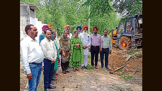 Officials at the freed land on Wednesday. (HT Photo)