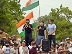 Top wrestlers Vinesh Phogat, Sakshi Malik and Bajrang Punia with supporters during their candlelight protest march Top wrestlers Vinesh Phogat, Sakshi Malik and Bajrang Punia with supporters during their candlelight protest march