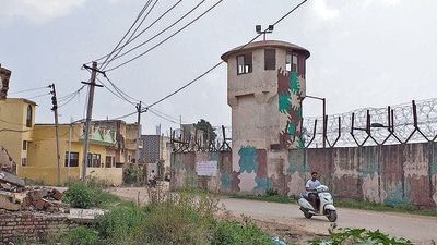 All structures within the 100-metre radious are to go due to security reasons. The Indian Air Force (IAF) has termed illegal mushrooming of illegal structures in the area a threat to the Shaheed Bhagat Singh International airport. (HT Photo)