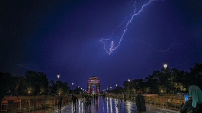At Kartavya Path in New Delhi on Thursday. The IMD has forecast on-and-off rain to continue in the Capital till May 29, with the month to end on a relatively cool note. (Raj K Raj/HT Photo) At Kartavya Path in New Delhi on Thursday. The IMD has forecast on-and-off rain to continue in the Capital till May 29, with the month to end on a relatively cool note. (Raj K Raj/HT Photo)