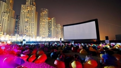 As a tourist or local: Every night of the festival, the Cinema de la Plage runs a different film on the Cannes beach. If you are a tourist or local, you can watch some of the best films from around the world for free. (Pinterest) As a tourist or local: Every night of the festival, the Cinema de la Plage runs a different film on the Cannes beach. If you are a tourist or local, you can watch some of the best films from around the world for free. (Pinterest)