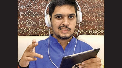 Ishaan Vivrekar of Fr. Agnel Multipurpose School & Junior College, a student with Tuberous Sclerosis Complex and Autism Spectrum, scores 63.83% in the HSC board exam. (BACHCHAN KUMAR / HT PHOTO) Ishaan Vivrekar of Fr. Agnel Multipurpose School & Junior College, a student with Tuberous Sclerosis Complex and Autism Spectrum, scores 63.83% in the HSC board exam. (BACHCHAN KUMAR / HT PHOTO)
