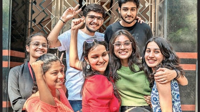 Mumbai, India - May 25, 2023: Students celebrate with Krisha Jain of Ruia College who scored 91.5% marks in Science stream after the HSC Class 12th Exam results were declared, at Dadar, in Mumbai, India, on Thursday, May 25, 2023. (Photo by Satish Bate/ Hindustan Times) (Satish Bate/HT PHOTO) Mumbai, India - May 25, 2023: Students celebrate with Krisha Jain of Ruia College who scored 91.5% marks in Science stream after the HSC Class 12th Exam results were declared, at Dadar, in Mumbai, India, on Thursday, May 25, 2023. (Photo by Satish Bate/ Hindustan Times) (Satish Bate/HT PHOTO)