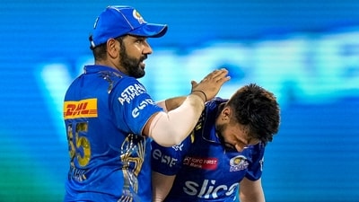 Mumbai Indians bowler Akash Madhwal celebrates with teammate Rohit Sharma the wicket of Lucknow Super Giants batter Ravi Bishnoi (PTI) Mumbai Indians bowler Akash Madhwal celebrates with teammate Rohit Sharma the wicket of Lucknow Super Giants batter Ravi Bishnoi (PTI)