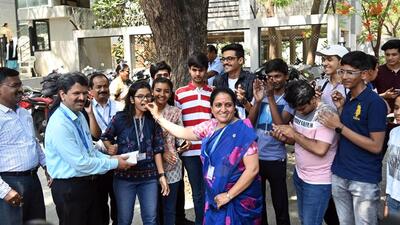 Students celebrate their success at BMCC College in the city after the announcement of HSC results on Thursday. (Kalpesh Nukte/HT PHOTO)