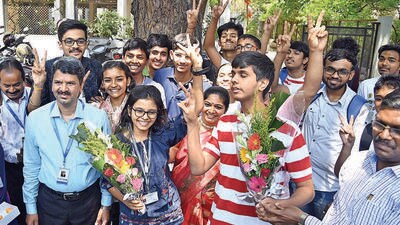 Students celebrate their success at BMCC College in the city after the announcement of HSC results on Thursday. (Kalpesh Nukte/HT PHOTO)