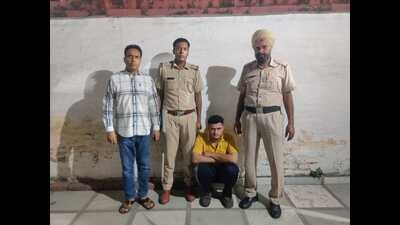 The accused in Panchkula police custody. (HT Photo)