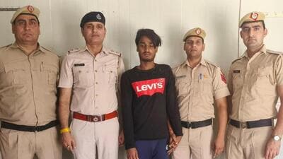 The suspect in police custody. (HT Photo)