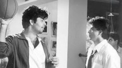Karan Johar and Shah Rukh Khan on Kuch Kuch Hota Hai sets.