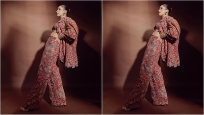 Sanya's breathtaking ensemble consists of a mesmerising three-piece outfit in a striking shade of red. The crop top is embellished with intricate hand-heavy embroidery and adorned with exquisite motifs. Paired with flared pants that showcase distressed knees, the ensemble is completed with an oversized jacket, adding an extra touch of style and flair. (Instagram/@sanyamalhotra_) Sanya's breathtaking ensemble consists of a mesmerising three-piece outfit in a striking shade of red. The crop top is embellished with intricate hand-heavy embroidery and adorned with exquisite motifs. Paired with flared pants that showcase distressed knees, the ensemble is completed with an oversized jacket, adding an extra touch of style and flair. (Instagram/@sanyamalhotra_)