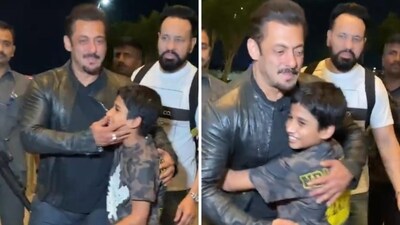 Salman Khan was spotted with a young fan at the Mumbai airport. Salman Khan was spotted with a young fan at the Mumbai airport.