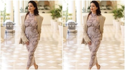 Sunny looked gorgeous in a multicoloured bodycon long dress, teamed with a beige oversized blazer. (Instagram/@sunnyleone) Sunny looked gorgeous in a multicoloured bodycon long dress, teamed with a beige oversized blazer. (Instagram/@sunnyleone)