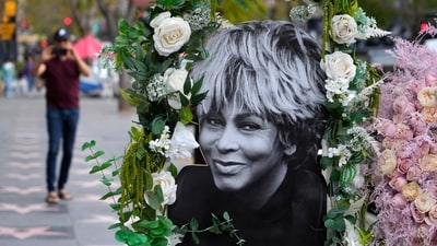 A portrait of the late singer Tina Turner stands atop her star on the Hollywood Walk of Fame, Wednesday, May 24, 2023, in Los Angeles. Turner died Tuesday at 83 after a long illness. (AP)