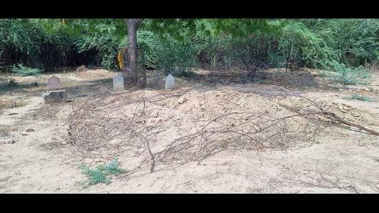 The graves of Atiq and Ashraf at Kasari Masari graveyard in Prayagraj . (HT)