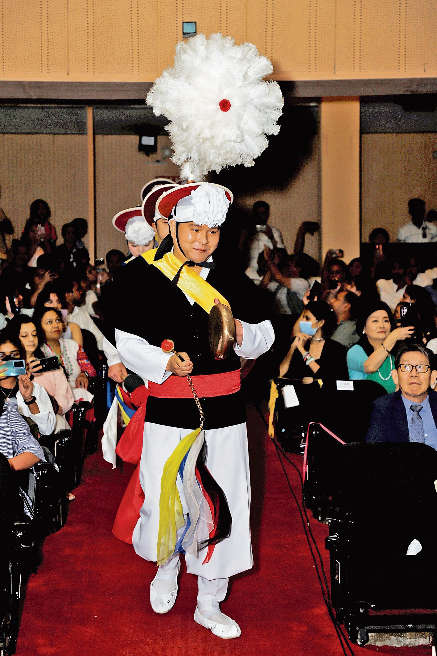 A student from South Korea was part of a traditional dance that depicts excitement. A student from South Korea was part of a traditional dance that depicts excitement.