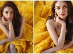 Aditi Rao Hydari, who is representing a giant cosmetic brand at the Cannes International Film Festival, made a glamorous appearance wearing a yellow asymmetrical layered gown.&nbsp;