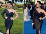 Sunny Leone enjoys an epic night at amfAR Cannes Gala in a shimmering black gown. Sunny Leone enjoys an epic night at amfAR Cannes Gala in a shimmering black gown.