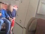 Screengrab of the video when a flight's emergency exit door was allegedly opened by a passengers in South Korea. 