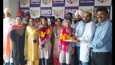 Gagandeep Kaur from Sant Mohan Das Memorial Senior Secondary School, Kot Sukhia, Faridkot, topped the state scoring 100%. Navjot from the same school stood second scoring 648 marks out of 650. (HT Photo) Gagandeep Kaur from Sant Mohan Das Memorial Senior Secondary School, Kot Sukhia, Faridkot, topped the state scoring 100%. Navjot from the same school stood second scoring 648 marks out of 650. (HT Photo)