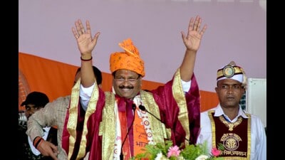 Ganesh Kesarwani waving to the crowd after being administered oath of office as the new mayor in Prayagraj on Friday. (HT photo)