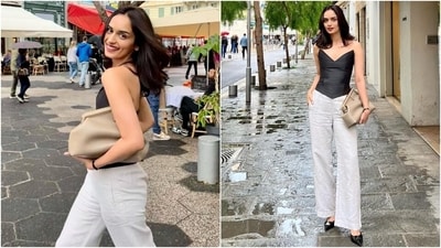 Manushi styled the ensemble with black heels, centre-parted open locks, a cream-coloured clutch, plum lips, minimal makeup, and mascara-adorned lashes. (Instagram) Manushi styled the ensemble with black heels, centre-parted open locks, a cream-coloured clutch, plum lips, minimal makeup, and mascara-adorned lashes. (Instagram)