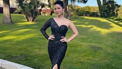 Sunny Leone attended the amfAR Cannes Gala in a black gown. Sunny Leone attended the amfAR Cannes Gala in a black gown.