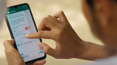 A villager in Haryana using Jugalbandi AI chatbot on WhatsApp. (Microsoft/Youtube)