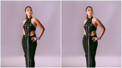 Mira looked stunning in a black saree gown featuring borders in shades of sequined pink. (Instagram/@mira.kapoor) Mira looked stunning in a black saree gown featuring borders in shades of sequined pink. (Instagram/@mira.kapoor)