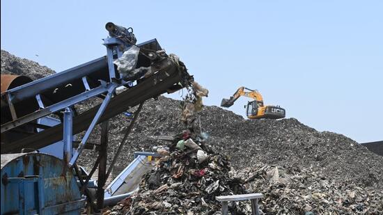 Gurugram, India-May 25, 2023: A Trommel Screen Machine processing legacy waste at a waste treatment plant at Bandhwari, in Gurugram, India, on Thursday, 25 May 2023. The Municipal Corporation of Gurugram (MCG) has decided to impose fine on four companies for delay in processing legacy waste at the site (Photo by Parveen Kumar/Hindustan Times)**To go with Leena's story