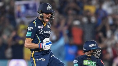 Gujarat Titans' Shubman Gill (R) celebrates after scoring a century (100 runs) during the Indian Premier League (IPL) Twenty20 second qualifier cricket match between Mumbai Indians and Gujarat Titans at the Narendra Modi Stadium in Ahmedabad on May 26, 2023. (Photo by Sajjad HUSSAIN / AFP) (AFP) Gujarat Titans' Shubman Gill (R) celebrates after scoring a century (100 runs) during the Indian Premier League (IPL) Twenty20 second qualifier cricket match between Mumbai Indians and Gujarat Titans at the Narendra Modi Stadium in Ahmedabad on May 26, 2023. (Photo by Sajjad HUSSAIN / AFP) (AFP)