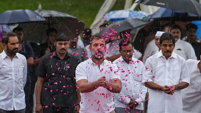 Congress leader Rahul Gandhi pays tribute to India's first prime minister Jawaharlal Nehru on his death anniversary, at Shanti Van in New Delhi, Saturday. (PTI)