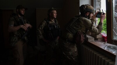 An officer of Ukraine's 59th Motorized Brigade controls a drone from a shelter in the suburbs of Donetsk, the site of fierce battles with the Russian forces. (AP) An officer of Ukraine's 59th Motorized Brigade controls a drone from a shelter in the suburbs of Donetsk, the site of fierce battles with the Russian forces. (AP)