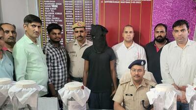The suspect in police custody on Saturday. (HT Photo)