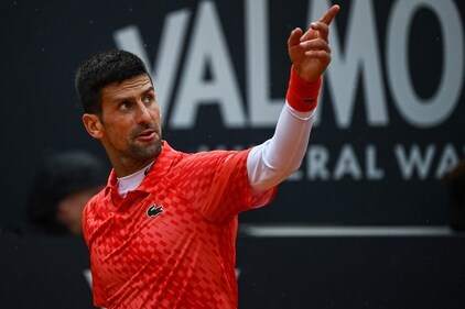 Serbia's Novak Djokovic reacts during his quarterfinals match of the Men's ATP Rome Open tennis tournament against Denmark's Holger Rune, at Foro Italico in Rome on May 17, 2023. (Photo by Filippo MONTEFORTE / AFP) (AFP) Serbia's Novak Djokovic reacts during his quarterfinals match of the Men's ATP Rome Open tennis tournament against Denmark's Holger Rune, at Foro Italico in Rome on May 17, 2023. (Photo by Filippo MONTEFORTE / AFP) (AFP)