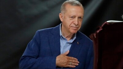 Turkish President Recep Tayyip Erdogan arrives to vote at a polling station during the second round of the presidential election in Istanbul on Sunday (AP) Turkish President Recep Tayyip Erdogan arrives to vote at a polling station during the second round of the presidential election in Istanbul on Sunday (AP)