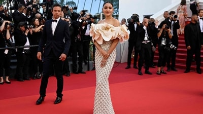 Several Indian celebrities made their Cannes debut this year, including Anushka Sharma. She graced the red carpet in a Richard Quinn gown and her minimal red carpet look was praised by many on social media. (AFP) Several Indian celebrities made their Cannes debut this year, including Anushka Sharma. She graced the red carpet in a Richard Quinn gown and her minimal red carpet look was praised by many on social media. (AFP)