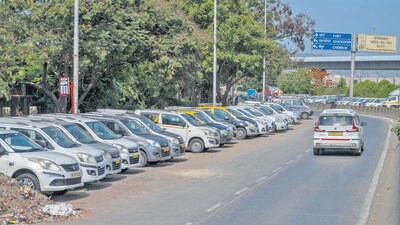 Ola, Uber cabs parked on the road side at Wadala in Mumbai on Sunday. (SATISH BATE / HT PHOTO)