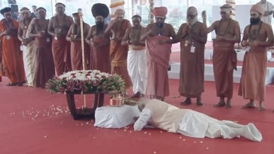 Prime Minister Narendra Modi prostrates before the 'Sengol' at the inauguration of the new Parliament building in New Delhi on Sunday, (PTI) Prime Minister Narendra Modi prostrates before the 'Sengol' at the inauguration of the new Parliament building in New Delhi on Sunday, (PTI)