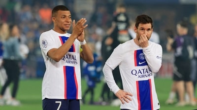 Paris St Germain's Kylian Mbappe and Lionel Messi celebrate after winning Ligue 1 (REUTERS)