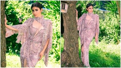 Mouni Roy made her debut on the red carpet of the 76th Cannes Film Festival this year. The actor is an absolute fashionista and is known for her sartorial sense of fashion. From sharing how to style fusion attire to her pictures in stunning sequined gowns, Mouni's fashion diaries are our favourite. A day back, Mouni shared a string of pictures of herself showcasing her latest look for the Cannes red carpet. (Instagram/@imouniroy) Mouni Roy made her debut on the red carpet of the 76th Cannes Film Festival this year. The actor is an absolute fashionista and is known for her sartorial sense of fashion. From sharing how to style fusion attire to her pictures in stunning sequined gowns, Mouni's fashion diaries are our favourite. A day back, Mouni shared a string of pictures of herself showcasing her latest look for the Cannes red carpet. (Instagram/@imouniroy)