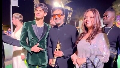 R Madhavan poses with son Vedaant Madhavan and wife Sarika at IIFA. R Madhavan poses with son Vedaant Madhavan and wife Sarika at IIFA.