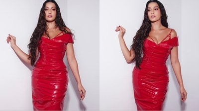 She opted to leave her beautiful, curly hair loose, cascading down her shoulders, complementing her glamorous look. With a vibrant red polish adorning her nails, she aced her look.&nbsp; (Instagram/@norafatehi)
