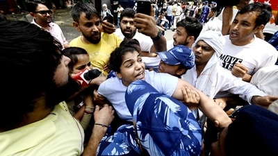 Delhi Police detains wrestler Sakshi Malik near Jantar Mantar during their protest march. (Sanjeev Verma/HT photo) Delhi Police detains wrestler Sakshi Malik near Jantar Mantar during their protest march. (Sanjeev Verma/HT photo)