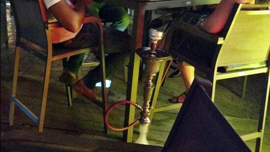 During search, 20 hookahs, 7 bottles of beer, various tobacco flavours and charcoal were confiscated. (File Photo)