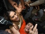Wrestlers Sangeeta Phogat and Vinesh Phogat being detained during the protest march from Jantar Mantar to New Parliament House against the alleged sexual harassment of women wrestlers by WFI chief Brij Bhushan Sharan Singh, in New Delhi on Sunday