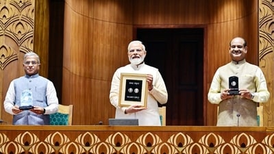 Prime Minister Narendra Modi with Lok Sabha Speaker Om Birla (right) and Rajya Sabha Deputy Chairman Harivansh Narayan Singh (left) at the inauguration of the new Parliament building. (Om Birla/Twitter)