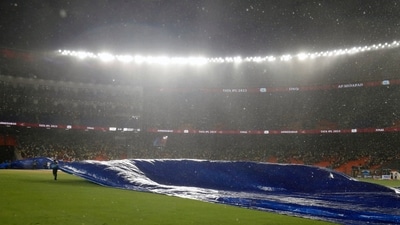 Ahmedabad, May 29 (ANI): Ground staff come onto the field with covers as rain interrupts play of the final match between Gujarat Titans and Chennai Super Kings in the Indian Premier League 2023, at Narendra Modi Stadium, in Ahmedabad on Monday. (ANI Photo)
 (ANI)