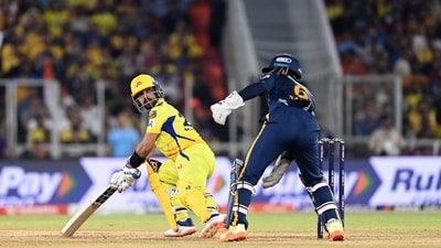Chennai Super Kings' Ajinkya Rahane (L) plays a shot during the Indian Premier League (IPL) Twenty20 final cricket match between Gujarat Titans and Chennai Super Kings at the Narendra Modi Stadium in Ahmedabad on May 30, 2023. (Photo by Sajjad HUSSAIN / AFP) (AFP)