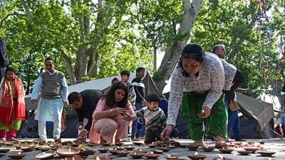 Kashmiri pandit devotees light earthen lamps and offer prayers as part of the Kheer Bhawani temple fair festivities at Tullamulla, Ganderbal (Waseem Andrabi /HiT) Kashmiri pandit devotees light earthen lamps and offer prayers as part of the Kheer Bhawani temple fair festivities at Tullamulla, Ganderbal (Waseem Andrabi /HiT)